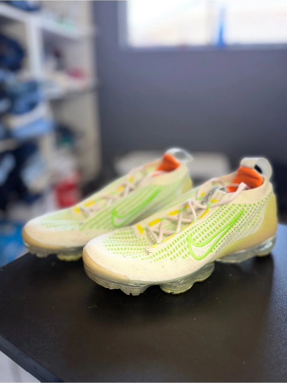 Nike White Sneakers with Neon Green and Orange Accents